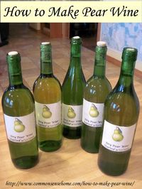 six bottles of wine sitting on top of a wooden table with the words how to make pear wine