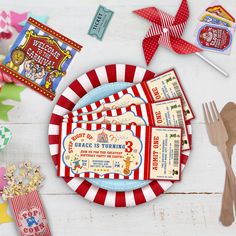 a circus themed birthday party set up with candy, tickets and napkins on a table