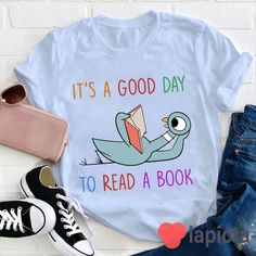 ✔️ TITTLE : It's A Good Day To Read A Book Teacher 2 T-Shirt, Book Shirt, Funny Chicken Shirt, Reading Book Shirt, Kindergarten Shirt, Teacher Shirt ✔️ IMPORTANT: Both Men and Women can we our shirts because this is unisex style t-shirts; Wash item inside out in cold water, do not bleach, do not dry clean, do not iron directly on the design. ✔️ MATERIAL DETAILS: 5.3-ounce, 100% cotton (99/1 cotton/poly (Ash) & 90/10 cotton/poly (Sport Grey); Heavyweight classic unisex tee; Taped neck and shoulde Chicken Shirt, Teachers Lounge, Book Shirt, Teaching Outfits, Kindergarten Shirts, Classroom Art, It's A Good Day, Funny Chicken, Chicken Shirts