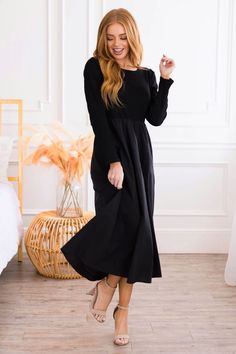 The dreamiest of dresses has just arrived! The Summit is what dreams are made of and is sure to sell out fast! Features include, classic black ribbed fabric, modest round neckline in the front and lower scoop line in the back, long sleeves, pockets and flowy tea length skirt. We know you're going to love it! Modest Solid Color Midi Dress, Black Modest Dress For Fall, Modest Solid Dresses For Fall, Modest Black Dress For Fall, Modest Solid Color Midi Dress For Fall, Modest Solid Color Maxi Dress, Modest Maxi Dress For Workwear In Fall, Modest Long Sleeve Midi Dress, Modest Long Sleeve Dress For Fall Workwear