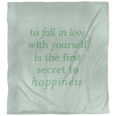 a blanket with the words to fall in love with yourself is the first secret to happiness