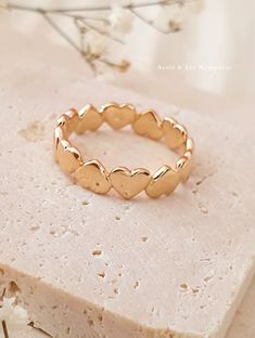 Fall in love again with the delicate and discreet "VALENTINE" ring, 18K gold plated that will stay with you forever. ♡ Features ♡ - Available sizes from 50 to 60FR - 18K gold plated with 5 microns - Elegant Packaging: Ready to give or to keep. - Timeless: Perfect for all occasions, a true ode to nature and the sea. ♡ Shipping Time ♡ Your order will be carefully prepared and shipped within 1 to 3 days. ✉️ Tracked Letter: By default, items are shipped via tracked letter, allowing you to precisely Gold Heart-shaped Stackable Midi Rings, Gold Stackable Heart Ring For Valentine's Day, Adjustable Gold Midi Rings For Valentine's Day, Gold Stackable Heart Midi Rings, Dainty Gold Midi Rings For Valentine's Day, Hypoallergenic Gold Heart Ring As Gift, Delicate Gold Heart-shaped Ring, Delicate Heart Shaped Gold Ring, Delicate Heart-shaped Gold Rings