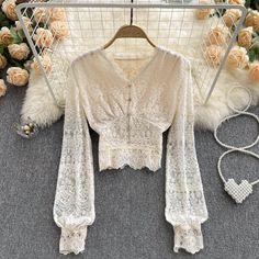 Chic Long Sleeve Beige Crop Top, Chic Beige Long Sleeve Crop Top, Cropped Lace Tops With Patchwork, Cropped Lace Tops With Lace Patchwork, Cropped Lace Patchwork Tops, Elegant Long Sleeve Lace Crop Top, Casual Long Sleeve Lace Top, Beige Long Sleeve Crop Top For Fall, Chic Beige Top With Delicate Lace