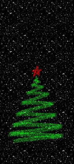 a green christmas tree on a black background with snow falling all over it and a red star