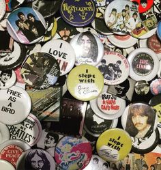 the beatles buttons are stacked on top of each other