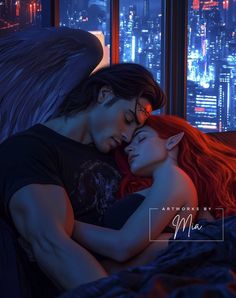 two people are cuddling on a bed in front of a window with city lights