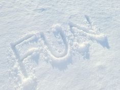 the word snow is written in the snow