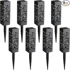 set of six black garden stakers with holes on each side and one hole in the middle