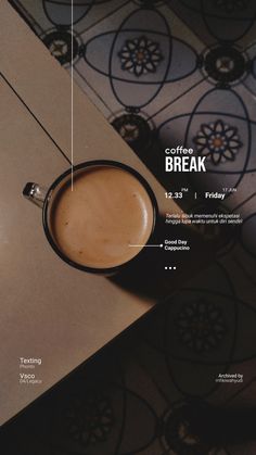 a cup of coffee sitting on top of a table