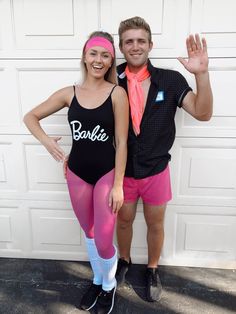 a man and woman dressed up in costumes