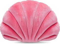 a pink shell shaped pillow on a white background