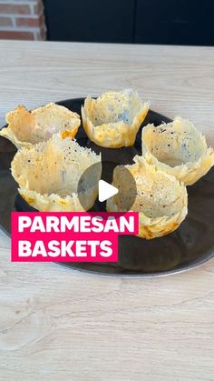 there is a black plate with some food on it and the words parmesan baskets