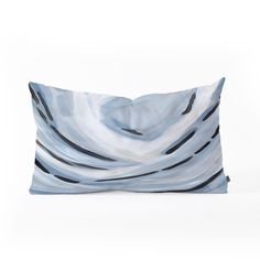 a blue and white pillow with black lines on it