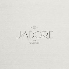 the logo for jadore is shown in black and white on a plain background