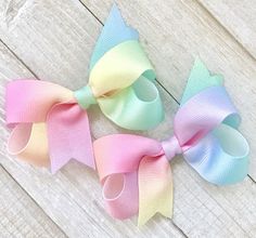 "Sugar Sweet Bows...Small 3 1/2\" Pastel Ombré Rainbow Girls Boutique Hair Bow. This small hair bow is the perfect size for Newborn Baby Girls up thru Toddler Girls. This listing is for 1 Bow, OR order a Pigtail Set of 2. See my shop for these bows made in more sizes and styles.  Ships in 3-5 business days. *ANNOUNCEMENT: The postal service is currently experiencing widespread shipping delays. If you need a order delivered faster, or by a specific date, please contact me and request to purchase Spring Bow, Pastel Rainbow Hair, Spring Hair Bows, Small Hair Bows, Stacked Hair Bow, Pastel Bows, Bow Birthday, Ribbon Ideas, Pigtail Bows