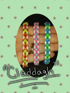 four different colored bracelets with the words caddagh on them in front of a green background