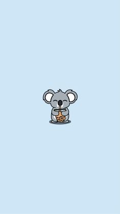 a cartoon koala holding a piece of food in it's mouth and sitting on the ground