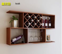 a shelf with wine bottles and glasses on it, next to a wall mounted wine rack