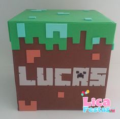 a box made out of paper with the words lucas on it