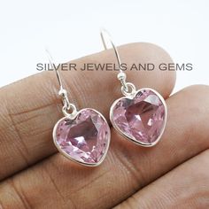 Gemstone-Pink Quartz Shape-Heart Stone Size - 12 MM Metal-925 Sterling Silver This One of a kind Earrings are adorned with beautiful Pink Quartz Gemstone in sterling silver.  About gemstone- Pink Quartz is the stone of universal love. It restores trust and harmony in relationships, encouraging unconditional love. Pink Quartz purifies and opens the heart at all levels to promote love, self-love, friendship, deep inner healing and feelings of peace. Add this beautiful pair of earrings of galactic shine to make you feel unique and to transform your lives. This classic pair of earrings is great for formal events,dinner,parties and is a functional accessory fit for casual day out. We accept custom and personalized order. It can be change in the gemstone,earrings design and size. Please send us Heart-shaped Crystal Earrings For Valentine's Day Anniversary, Silver Rose Quartz Earrings For Gift, Pink Rose Quartz Earrings Gift, Pink Heart-shaped Adjustable Earrings, Valentine's Day Heart-shaped Rose Quartz Jewelry, Heart Stone, Earring Handmade, Inner Healing, Heart Shaped Earrings