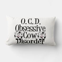 a pillow with the words o c d obsesive cow disorder printed on it