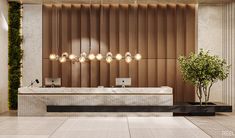 an elegant bathroom with marble counter tops and lights hanging from the ceiling, along with a potted plant