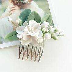 This flower hair comb with еucalyptus leaves and white and ivory flowers is fully handmade. Each element (flower, petal or leaf) is made entirely by hands from material called cold porcelain and toned with soft pastel. These flowers look much like fresh flowers but they will never fade. I use only non-allergic nickel free bases for my items.This flower comb is absolutely unique and perfect to emphasize your natural beauty. Flowers are tender and delicate. It will be perfect for greenery and succ Rustic Wedding Veil, Succulent Hair, Beaded Hair Combs, Southwestern Wedding, White Ranunculus, Floral Hair Pieces, Beauty Flowers, Flower Hair Pieces, Feuille Eucalyptus