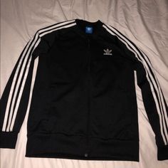 Brand New Adidas Black Sweater With The 3 White Stripes On The Side. Size Small Adidas Fitted Casual Track Jacket, Fitted Casual Adidas Track Jacket, Casual Black Track Jacket With Side Stripes, Black Tops With Side Stripes For Streetwear, Black Track Jacket With Side Stripes For Streetwear, Black Crew Neck Track Jacket For Fall, Casual White Track Jacket With Side Stripes, Casual Black Outerwear With Side Stripes, Black Tops With Three Stripes For Fall