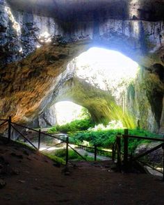 the entrance to an underground cave is shown