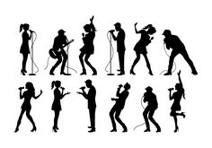 the silhouettes of people singing with microphones and hair dryers in their hands