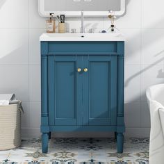 a bathroom vanity with a mirror above it