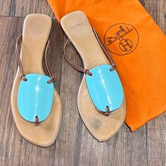 Size 37 (Fits Like 6 1/2) Good Condition. Accurate Of The Photos. Comes With Dustbag. Hermes T Strap Tan And Teal Leather Flip Flop Style Flip Flops Style, Teal Leather, Hermes Shoes, Leather Flip Flops, T Strap, Flip Flop, Women's Shoes Sandals, Leather Sandals, Flip Flops