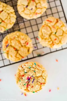 cookies with sprinkles on a cooling rack