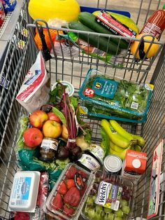 a shopping cart filled with lots of food