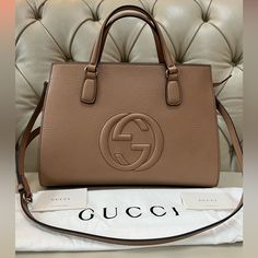 Brand New Gucci Soho Top Handle Satchel Leather Bag With A Long Shoulder Strap And Top Full Zipper, Made In Italy. It Comes With A Dust Bag, Protective Cloth For A Strap And A Pouch As Well As Authenticity Cards. Everything In My Closet Is Authentic And Pm Will Authenticate It For You For Free Dimensions Base Length Is 14” Height 10” Width 6.5” Gucci Shoulder Bag With Logo For Daily Use, Gucci Shoulder Bag With Logo And Top Handle, Elegant Gucci Shoulder Bag With Logo, Gucci Handbags Outlet, Gucci Soho, Gucci Handbag, Bags Designer Fashion, Carry All Bag, Gucci Handbags