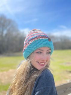 This is a beautiful, warm, and soft double sided handmade knit toboggan. Made extra thick to keep you super warm.  One size fits most. Adjustable brim. This hat is also reversible!!  The Turquoise and Jewel toned colors pop! Cozy Multicolor Hat, One Size Fits Most, Casual Multicolor Beanie One Size, Adjustable Handmade Knit Beanie, Handmade One Size Beanie For Cold Weather, Handmade One-size Beanie For Cold Weather, Multicolor Casual Bonnet One Size, Casual Multicolor Bonnet One Size, Casual Multicolor Bonnet, Multicolor Knit Beanie One Size