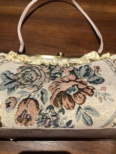 Vintage brocade lace patchwork hand bag purse Vintage styled bag Nice brocade florals with golden threads 6 in x 13 in 18 in wrist strap All shipped free in the US Please check out our THOUSANDS of great reviews Formal Tapestry Bags, Gold Tapestry Rectangular Bag, Vintage Tapestry Shoulder Bag With Removable Pouch, Victorian Style Rectangular Tapestry Bag, Vintage Rectangular Fabric Shoulder Bag, Vintage Rectangular Fabric Bag, Victorian Style Embroidered Rectangular Bag, Vintage Style Bag, Purse Vintage