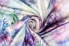 Experience elegance with our luxurious Italian silk charmeuse fabric. Soft and with a light, fluid drape, this fabric is perfect for any special occasion. The unique and vibrant tie-dye print adds a touch of originality, making a statement piece for any wardrobe. Elegant Multicolor Silk Scarf For Wedding, Silk Scarf For Party In Spring, Silk Scarf For Spring Party, Summer Silk Scarf With Satin Finish, Multicolor Printed Silk Scarf, Elegant Silk Scarf With Paisley Print, Multicolor Satin Silk Scarf For Spring, Multicolor Silk Scarf With Paisley Print, Multicolor Silk Scarf For Party In Spring