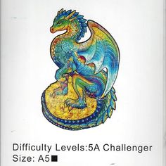 a book with an image of a dragon sitting on top of it's back