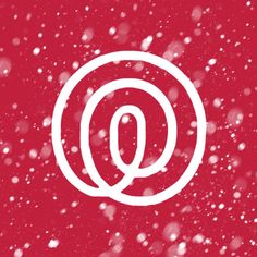 a red background with the letter q and snow flakes in the foreground,