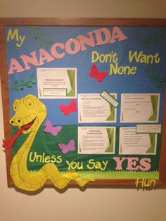 a bulletin board with an image of a yellow dinosaur and butterflies on it, which reads my anaconda don't want none unless you say yes