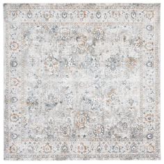 an area rug with grey, orange and white colors on the bottom half of it