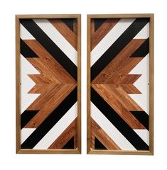 two wooden doors with black and white stripes on them