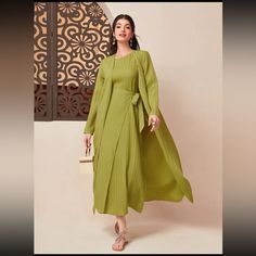 Never Worn. Size 8-10 Green Maxi-length Abaya For Spring, Spring Green Maxi Length Abaya, Green Long Sleeve Abaya For Spring, Long Sleeve Green Abaya For Spring, Spring Green Long Sleeve Abaya, Elegant Spring Tunic Abaya, Long Green Spring Abaya, Elegant Green Spring Abaya, Hot Pink Mini Dress