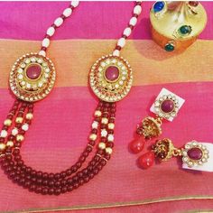 Beautiful maroon and white bead and stone worked necklace set that comes  a necklace and 2 earrings. This beautiful piece would with traditional saree, kanjeevaram and cotton saree. Bollywood Style Mala With Stone Work For Puja, Festival Jewelry Sets With Stone Work And Round Beads, Festival Jewelry Sets With Stone Work, Traditional Jewelry Sets With Round Beads For Diwali, Festive Mala With Stone Work For Puja, Festive Stone Work Mala For Puja, Traditional Festival Jewelry Set With Long Necklace, Traditional Long Necklace Jewelry Set For Festivals, Bollywood Style Round Bead Jewelry Sets For Festivals