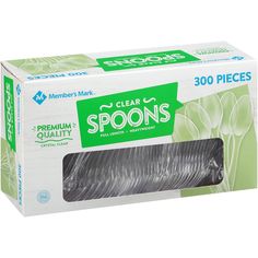 a box of clear spoons on a white background