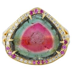 This stunning ring has been meticulously crafted from 18-karat gold. It is hand set in 9.67 carats tourmaline, .17 carats sapphire and illuminated with .54 carats of glittering diamonds. The ring is a size 7 and may be resized to larger or smaller upon request. FOLLOW MEGHNA JEWELS storefront to view the latest collection & exclusive pieces. Meghna Jewels is proudly rated as a Top Seller on 1stDibs with 5 star customer reviews. All items manufactured by us are handmade and can be customized or r Chrome Tourmaline, Real Diamond Necklace, Enchanted Jewelry, Sapphire Cocktail Ring, Platinum Diamond Rings, Pink Sapphire Ring, Gold Cocktail Ring, Diamond Glitter, Diamond Cocktail Rings