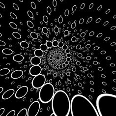 an abstract black and white photo with circles in the center, on a black background