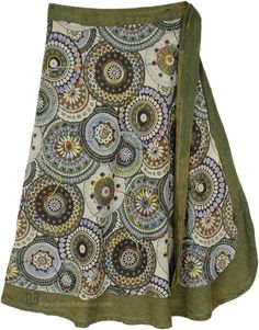 A soft floral green-toned wrap skirt with colorful embroidery details. This wrap-around skirt has twin layers with the bottom layer as stonewashed green and the upper layer printed floral; creating a flowing look. #tlb #WrapAroundSkirt #Stonewash #Floral #Printed #bohemianfashion #FairySkirt Spring Hippie Cotton Wrap Skirt, Hippie Cotton Wrap Skirt For Spring, Green Bohemian Wrap Skirt For Spring, Spring Green Cotton Wrap Skirt, Green Cotton Wrap Skirt For Spring, Green Bohemian Long Wrap Skirt, Bohemian Green Wrap Skirt For Festival, Bohemian Green Long Wrap Skirt, Green Hippie Skirt For Spring