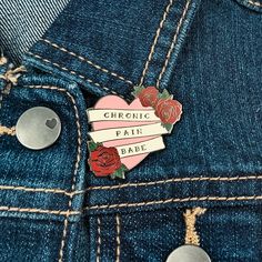 CHRONIC PAIN BABE Pin - Chronic Illness Pin, Chronic Pain Pin, Spoonie Hard Enamel Pin, Illness Awareness Pin, Rare Disease Awareness  READY TO SHIP "Chronic Pain Babe" Hard Enamel Pin. The pin measures approximately 1.25" x 1.25".   Please note: all photos of enamel pins in my shop are taken on a Children's Place™ denim jacket in size 2T. To get an accurate representation of the size of the pin I recommend looking at the exact dimensions of the pin. Thanks ☺️  The back of the pin will have one Rare Disease Awareness, Rare Disease, Hard Enamel Pin, Pin Badges